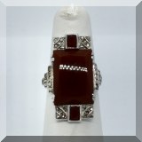 J049. Sterling art deco ring with dark orange stone. Size 5.25 - $85 